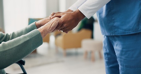 Image showing Nurse, senior patient and holding hands in closeup for support, help and recovery in retirement. Physiotherapist, care and elderly person with disability in wheelchair at clinic for rehabilitation