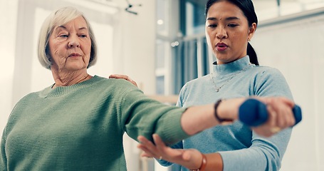 Image showing Senior care, training and physiotherapist with old woman, dumbbell and healthcare for nursing. Physio, rehabilitation and retirement with fitness, caregiver with elderly patient for mobility exercise