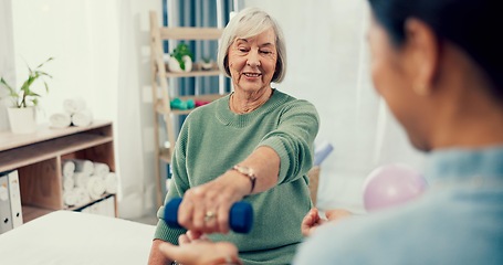 Image showing Senior woman, physiotherapy and dumbbell for exercise, support and stretching arm in physical therapy exam. Elderly patient and nurse with workout for shoulder pain, fitness and medical consultation