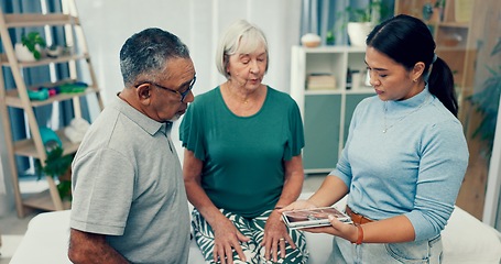 Image showing Senior, physiotherapy and couple with doctor and tablet for a consultation and retirement healthcare. Rehabilitation, patient and woman speaking to a physiotherapist with tech for medical advice