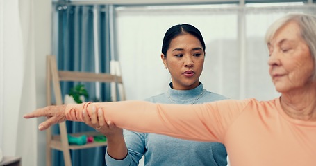 Image showing Physiotherapy, stretching and senior patient in consultation for support, exam and helping with shoulder in office. Doctor, physiotherapist or nurse with elderly woman for muscle massage or service