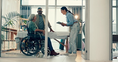 Image showing Senior, physiotherapy and couple with doctor and tablet for a consultation and person with disability. Rehabilitation, patient and woman speaking to a physiotherapist with tech for medical advice