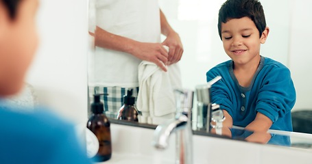 Image showing Family, cleaning and boy with hands in sink in bathroom with father and skincare for hygiene at home together. Love, smile and dad with happy child with water, liquid and soap for washing and health