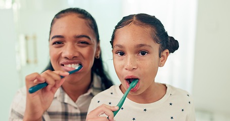 Image showing Portrait, brushing teeth and mother with daughter, morning routine and healthy in bathroom. Face, family or mama with kid and child development with wellness or toothbrush with fresh breath or dental