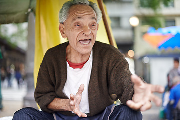 Image showing Conversation, city and elderly man talking in a neighborhood outdoor with chat and communication. Urban, sitting and senior Asian male person with wisdom, street and road with travel and advice