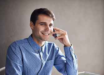Image showing Phone call, office and business man in conversation, discussion and talking for b2b networking. Professional, corporate and person on smartphone for communication, chatting online and speaking