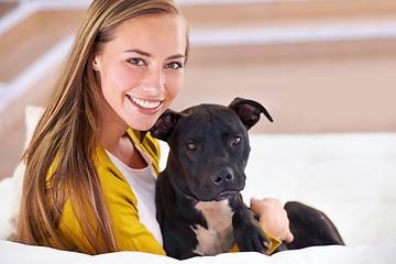 Image showing Woman, dog and relax on sofa in portrait, smile for pet love and bonding at home with domestic canine. Happy, positive and trust with foster or adoption, cuddle puppy in living room and animal care