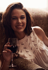 Image showing Woman, portrait and armchair smile with wine to relax, home and alcohol in natural ambient light. Happy, enjoyment or liquid in glass, comfortable at house after meal in free time on weekend holiday