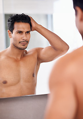 Image showing Bathroom mirror, body and man with hair check in a house for skincare, wellness or morning routine. Hairline, reflection and male person with growth, texture or satisfaction after shower at home