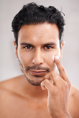 Image showing Skincare, portrait and cream with man in bathroom for morning routine, facial treatment and cosmetics. Self care, confidence and face of male person for sunscreen, lotion or collagen moisturizer.