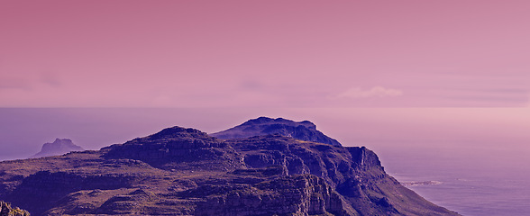 Image showing Mountain top, nature and pink sky background for travel, hiking and eco friendly tourism with banner of Cape Town. Aerial view of sunset, landscape and sea or ocean on horizon in South Africa mockup