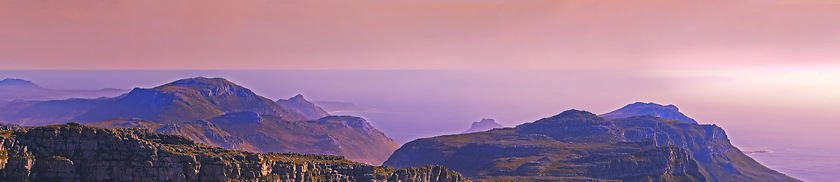 Image showing Mountain top, landscape and pink sky background for travel, hiking and eco friendly tourism with banner of Cape Town. Aerial view of sunset, nature and sea or ocean on horizon in South Africa mockup