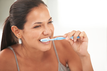 Image showing Health, bathroom and woman with toothbrush for cleaning, oral hygiene and dental care in home. Toothpaste, healthcare and person brushing teeth for whitening, wellness and grooming for gum disease