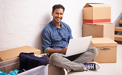 Image showing Portrait, man and laptop by boxes in new house, apartment or property for moving, relocating or buying a home. Male person, real estate and mortgage for homeowner with computer, communication or tech