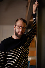 Image showing Man, portrait and confident in home for satisfaction, smile and pride for comfort or enjoyment in living room. Male person, glasses and happy with eyewear for wellness, lounge and face in apartment