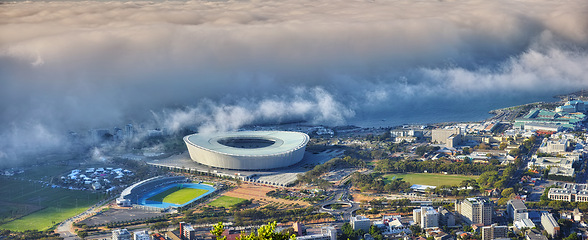 Image showing Cityscape, skyline and Cape Town in South Africa for travel, journey and adventure in nature. Landscape, sea and holiday or vacation for freedom, stadium and table mountain as location for tourists