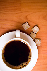 Image showing cup of coffee and sugar