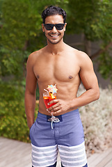 Image showing Summer, vacation and portrait of man with cocktail to relax, drink at hotel and travel to luxury villa in Mexico. Outdoor, holiday and glass of alcohol in hand on deck at poolside with hospitality