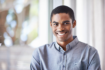 Image showing Happy black man, portrait and window with ambition for career, job or creative startup at office. Face of African male person or employee with smile in confidence for expertise or positive mindset