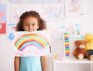 Image showing School, education and portrait of girl with rainbow painting in a classroom for creative, learning or child design. Paper, color splash or face of excited kid with kindergarten art, sketch or drawing