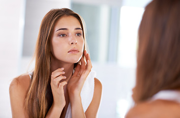Image showing Woman, mirror and skincare beauty in bathroom for cosmetic facial for treatment, natural or washing. Female person, hand and reflection in home for dermatology glow for heath, self care or wellness