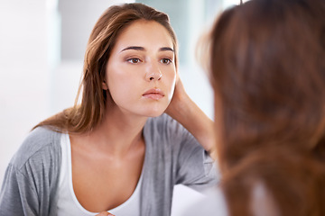 Image showing Woman, mirror and skincare for natural beauty for healthy cosmetic facial, treatment or washing. Female person, hand and reflection in home for dermatology glow for heath, self care or transformation