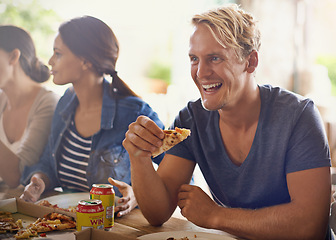 Image showing Friends, man and eating of pizza in home with laughing, soda and social gathering for bonding in dining room. Men, women and fast food with joke, funny and diversity at table in lounge of apartment