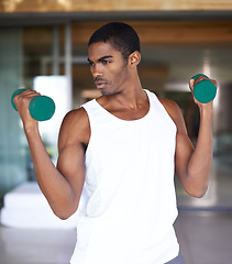 Image showing Black man, dumbbell and workout with exercise for bodybuilding, training and fitness. African person, lifting weights and idea or vision with equipment for endurance, wellness and muscle strength