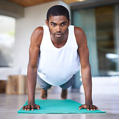 Image showing Fitness, yoga and portrait of black man in home for wellness, flexibility and balance for healthy body. Training, pilates and person on sports mat for stretching, workout and exercise in living room