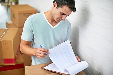 Image showing Man, boxes and home with clipboard for moving, delivery and documentation for logistics, check and invoice. Person, cardboard and package with paperwork for service, signature or stock in new house