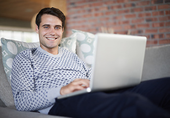 Image showing Relax, smile or portrait of man on laptop for remote work, article post website or network online. Freelancer, research or happy person on sofa typing on technology for startup, email or news in home