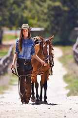 Image showing Cowboy, horse or happy woman in portrait or walk together on western ranch in country. Trainer, face or smile by strong stallion of american quarter thoroughbred or pride for healthy animal on farm