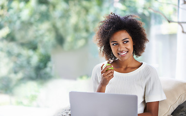 Image showing Apple, laptop and thinking with black woman on sofa in living room of home for health or remote work. Computer, smile and startup business with happy young person in apartment for startup career