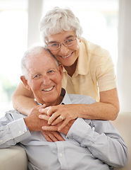 Image showing Couple, senior and hug or portrait on couch, home and relax together for bonding and smile. Elderly people, embrace and care in marriage or relationship in retirement, love and security in house