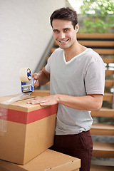 Image showing Man, portrait and boxes in home for moving with investment in real estate, new house pr relax with happiness. Person, face or smile with tape on cardboard for storage, cargo or package for relocating