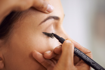 Image showing Woman, makeup and eyeliner with mascara pencil for beauty, cosmetics or art at salon or spa. Closeup of female person or stylist applying shadow, contour or color for facial eye treatment or glamour