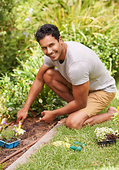 Image showing Portrait, smile and man in a garden, sunshine and summer with earth and grass with weekend break. Person, outdoor and guy with tools and backyard with environment and nature with fresh air and lawn