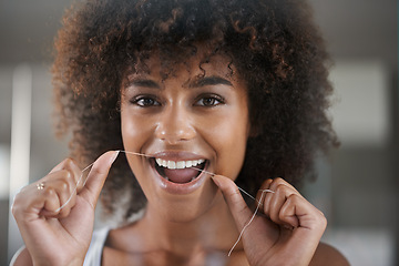 Image showing African woman, dental floss and happy in portrait for oral wellness, health and benefits for mouth in bathroom. Girl, person and teeth whitening with string, cleaning and change for results in house