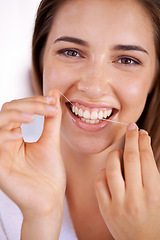 Image showing Smile, wellness and portrait of woman with floss for health, dental and clean routine for hygiene. Oral care, happy and female person with dentistry tool for teeth or mouth treatment in bathroom.