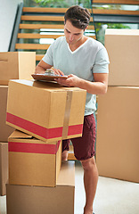 Image showing Man, boxes and delivery with clipboard in home, logistics and check documentation for reading, invoice and tax. Person, cardboard and package with paperwork for service, cargo and stock in new house