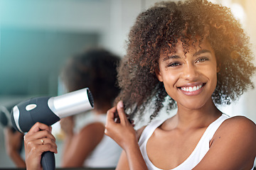 Image showing Black woman, hairdryer and hair with texture in portrait, curly hairstyle or frizz for morning routine in bathroom. Natural beauty, haircare and heat treatment for growth, shine and cosmetics at home