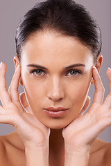 Image showing Portrait, wellness and woman with beauty, skincare or dermatology on grey studio background. Face, person or model with glow or shine with grooming or healthy skin with treatment, luxury or aesthetic