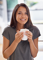 Image showing Woman, coffee and mug with kitchen, portrait and morning for home routine. Person, cup and tea with house, beverage and aroma for relax and caffeine or taste to enjoy break with happiness and rest