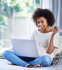 Image showing Apple, fresh produce and woman on sofa with laptop for social media, lifestyle blog and food website at home. Happy female person, technology and fruit for nutrition, healthy diet and clean eating