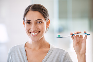 Image showing Woman, portrait and toothbrush with smile in home for health, wellness and care for teeth in morning. Girl, person and happy for teeth whitening, mouth and cleaning for hygiene at apartment in Chile