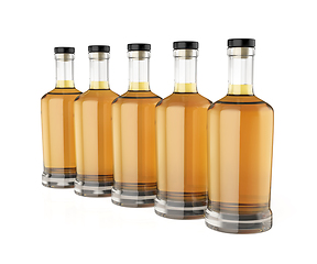 Image showing Row with five whisky bottles