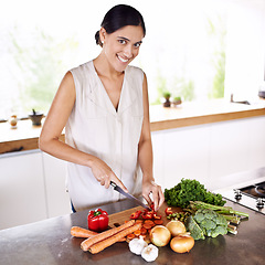 Image showing Cooking, vegetables and portrait of woman at kitchen counter with healthy food for nutrition in diet. Happy, wellness and vegan person meal prep with carrot, onion and broccoli for dinner in home