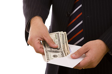 Image showing businessman counting his money