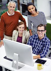 Image showing Business people, portrait and diversity in collaboration at computer in office, smile and planning. Coworkers, unity and support for project or proposal, report and website for research at agency