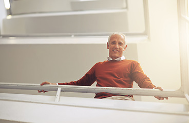 Image showing Low angle, business and portrait with man, stairs and creative agency with professional and PR consultant. Face, mature person and employee with happiness and entrepreneur with steps and startup